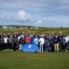 Golfers raise thousands for sports project