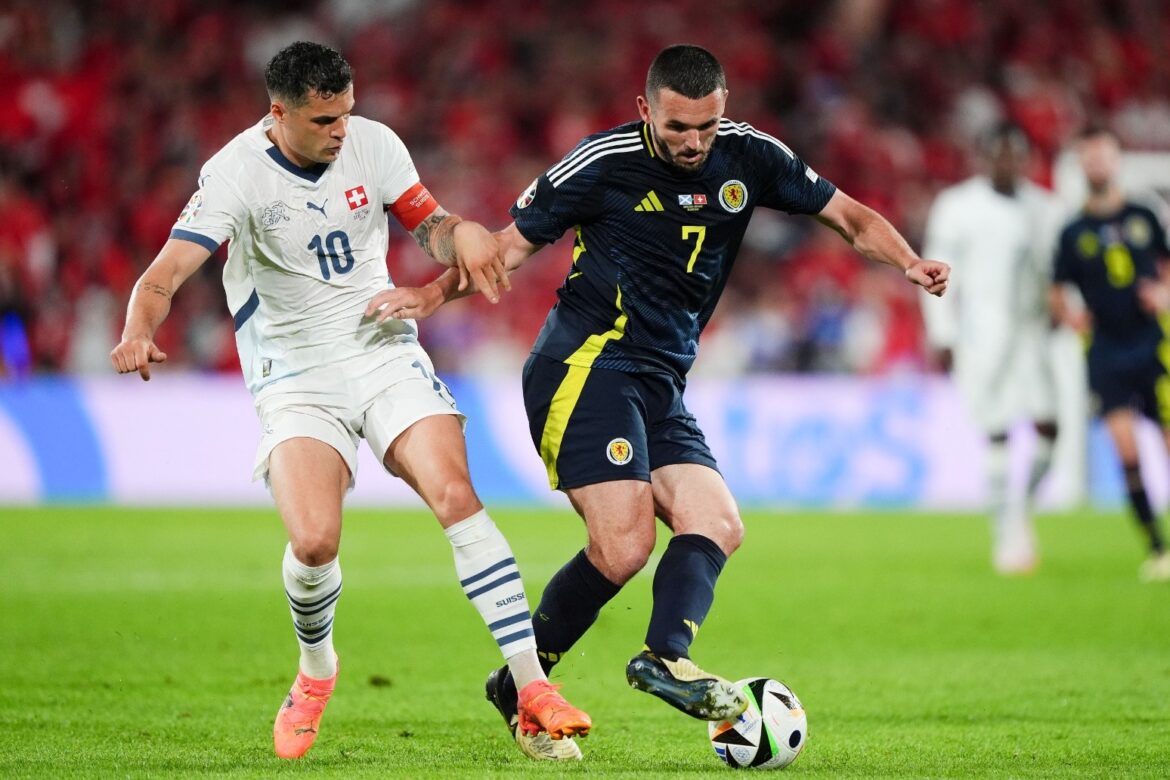 Scotland boost hopes of making it through group stage