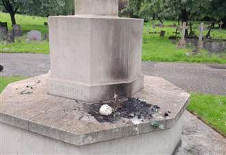 Two teens questioned by police after war memorial set on fire