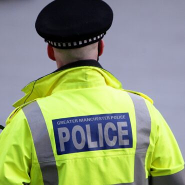 Eight officers suspended by Greater Manchester Police over racism accusation