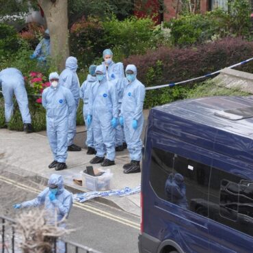 Man appears in court charged with murder over bodies found in suitcases