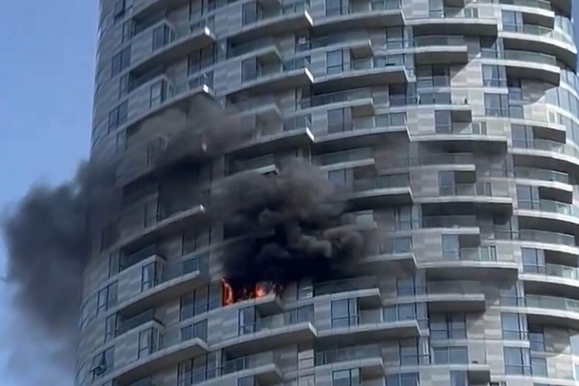 Around 70 firefighters tackle blaze at 45-storey block in Blackwall, east London