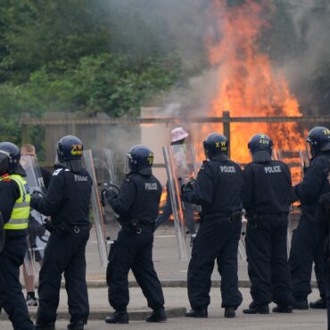 Demonstrators attack police and target hotel as riots continue