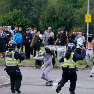 Police steeled for further violence as more than 140 charged over riots