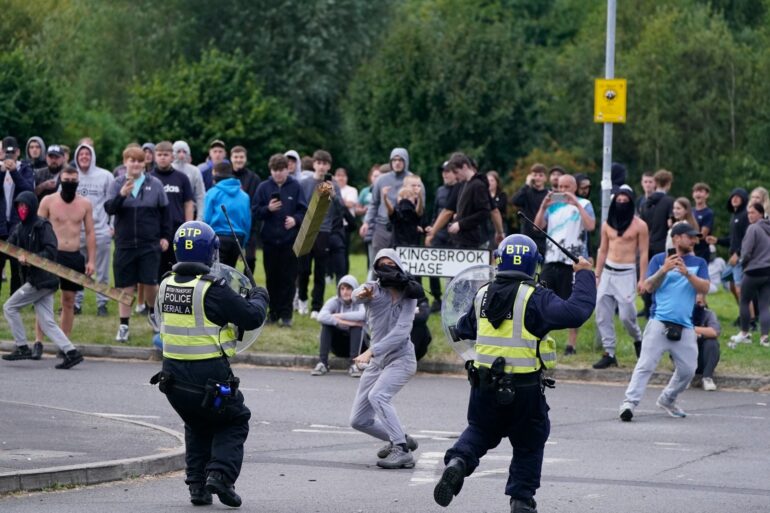 Police steeled for further violence as more than 140 charged over riots