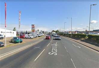 Road blocked following crash between car and ambulance