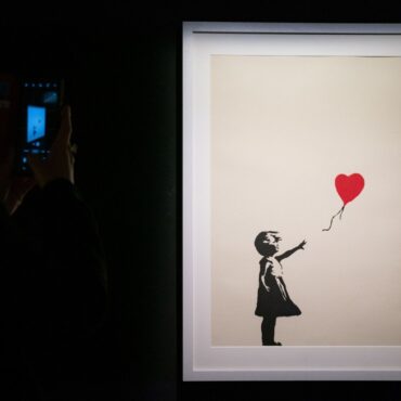 Two charged with burglary after Banksy painting stolen from London gallery