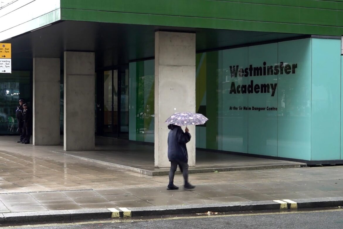 Man arrested following suspected acid attack outside school