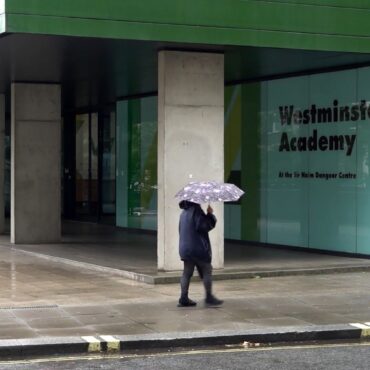 Man arrested following suspected acid attack outside school