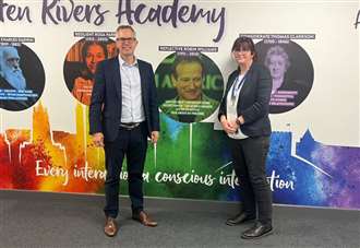 MP chats with staff and pupils over coffee and cake