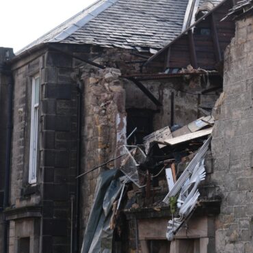 Police inquiries ongoing after man killed and three injured in flats blast