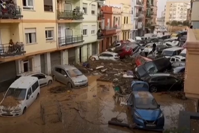 Search for bodies after flood of the century claims at least 95 lives in Spain