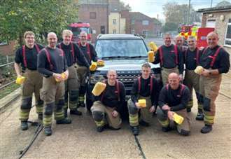 Thousands raised by firefighters from car wash challenge