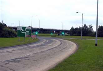 Two-vehicle crash on busy town roundabout