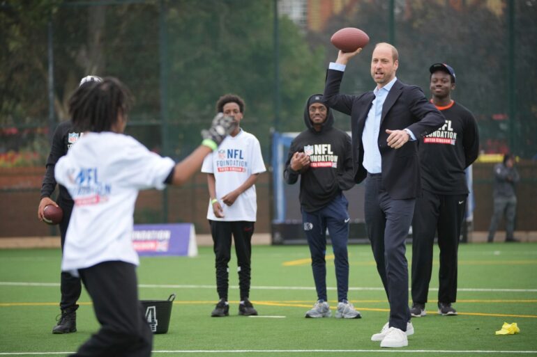 William shows off ‘unbelievable arm’ playing American football with youngsters