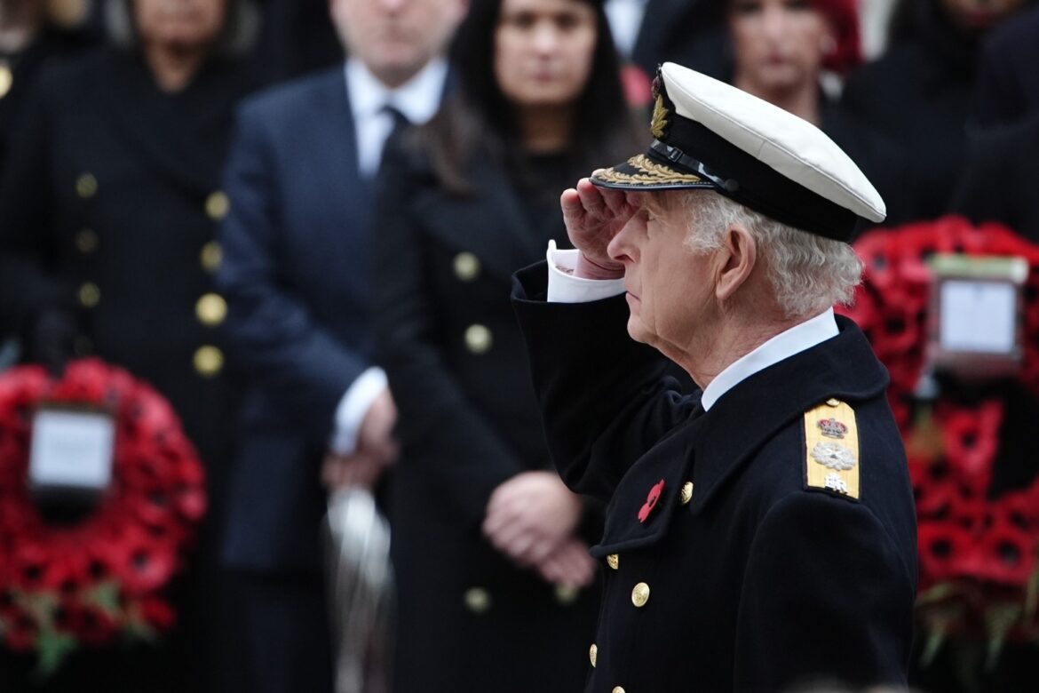 King lays wreath at Cenotaph as nation falls silent in remembrance