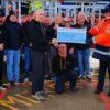 Triathletes present cheque to RNLI