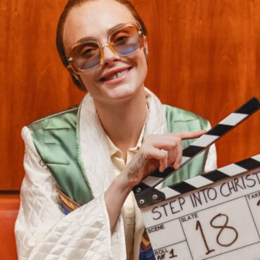 Cara Delevingne plays Elton John in Step Into Christmas video