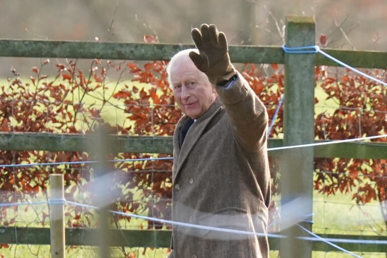 King waves as he leaves Sandringham church service