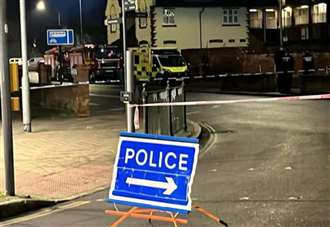 Man arrested on suspicion of harassment after incident which saw road closed off