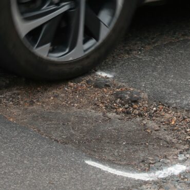 PM urges councils to get on with fixing broken roads