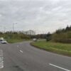 Police at scene of two-vehicle crash on roundabout