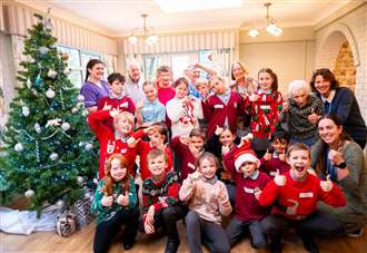 Pupils spread festive cheer by singing to the elderly