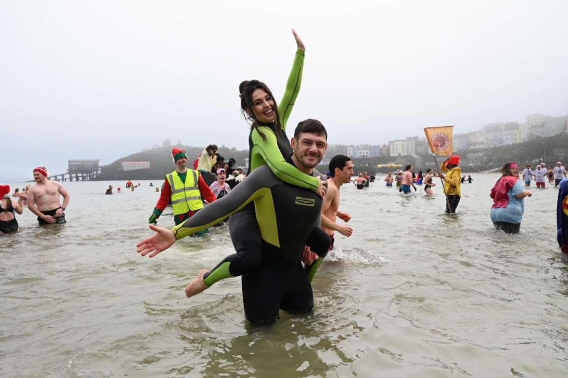 Romantic proposal makes waves at Tenby Boxing Day swim