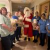 Volunteers bring Christmas magic to sick and premature babies at hospital