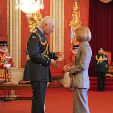 Anna Wintour says she will not stop working as she is honoured at palace