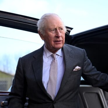 King greeted by cheering crowds at JCB headquarters in Staffordshire