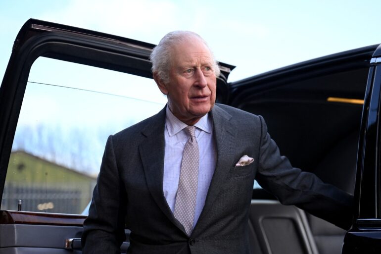 King greeted by cheering crowds at JCB headquarters in Staffordshire