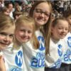 Primary school youngsters in fine voice at arena concert