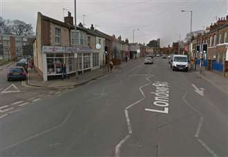 Two cars crash outside driver training centre on busy road