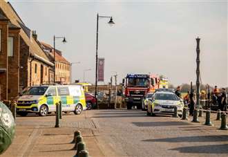 Man taken to hospital after falling into river