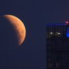 UK stargazers wake up to rare blood moon partial lunar eclipse