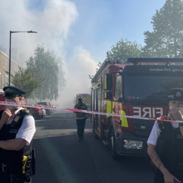 Flats evacuated as 100 firefighters tackle substation blaze in west London