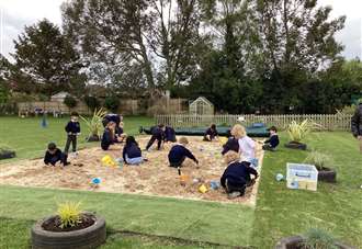 Excitement at town primary school as new sandpit installed