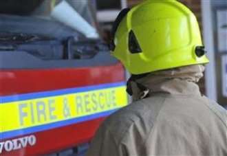 Fire crews battle business blaze in town