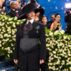 Rihanna debuts baby bump on star studded Met Gala blue carpet