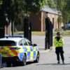 Two firefighters and a member of the public have died after a fire at a former RAF base in Bicester