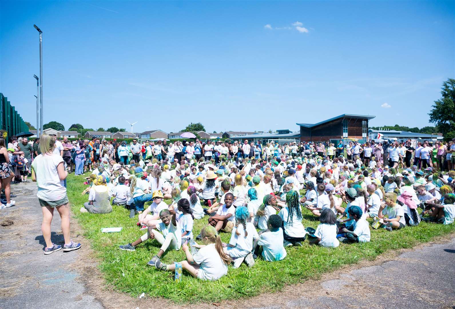 Warm-up time in preparation for the fun colour run. Picture: Ian Burt