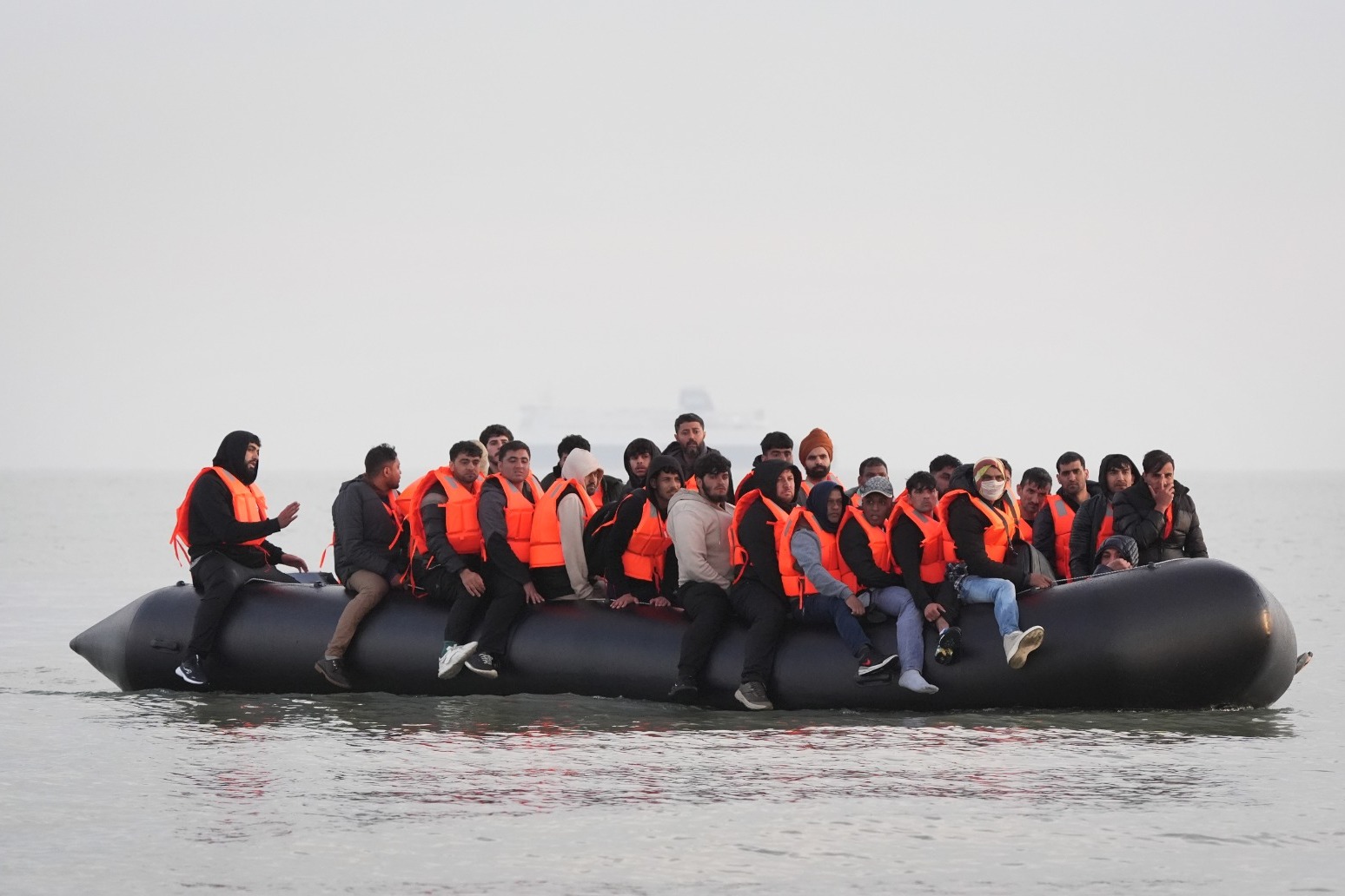 Migrant daily arrivals top 1000 for first time this year