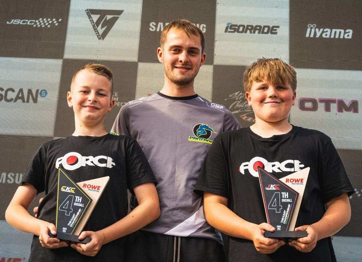 Jenson Sayell (left) with his fourth-place trophy, TWRacing manager Tommy Weyer (centre) and team-mate Alfie Forrester. Picture: Josh East