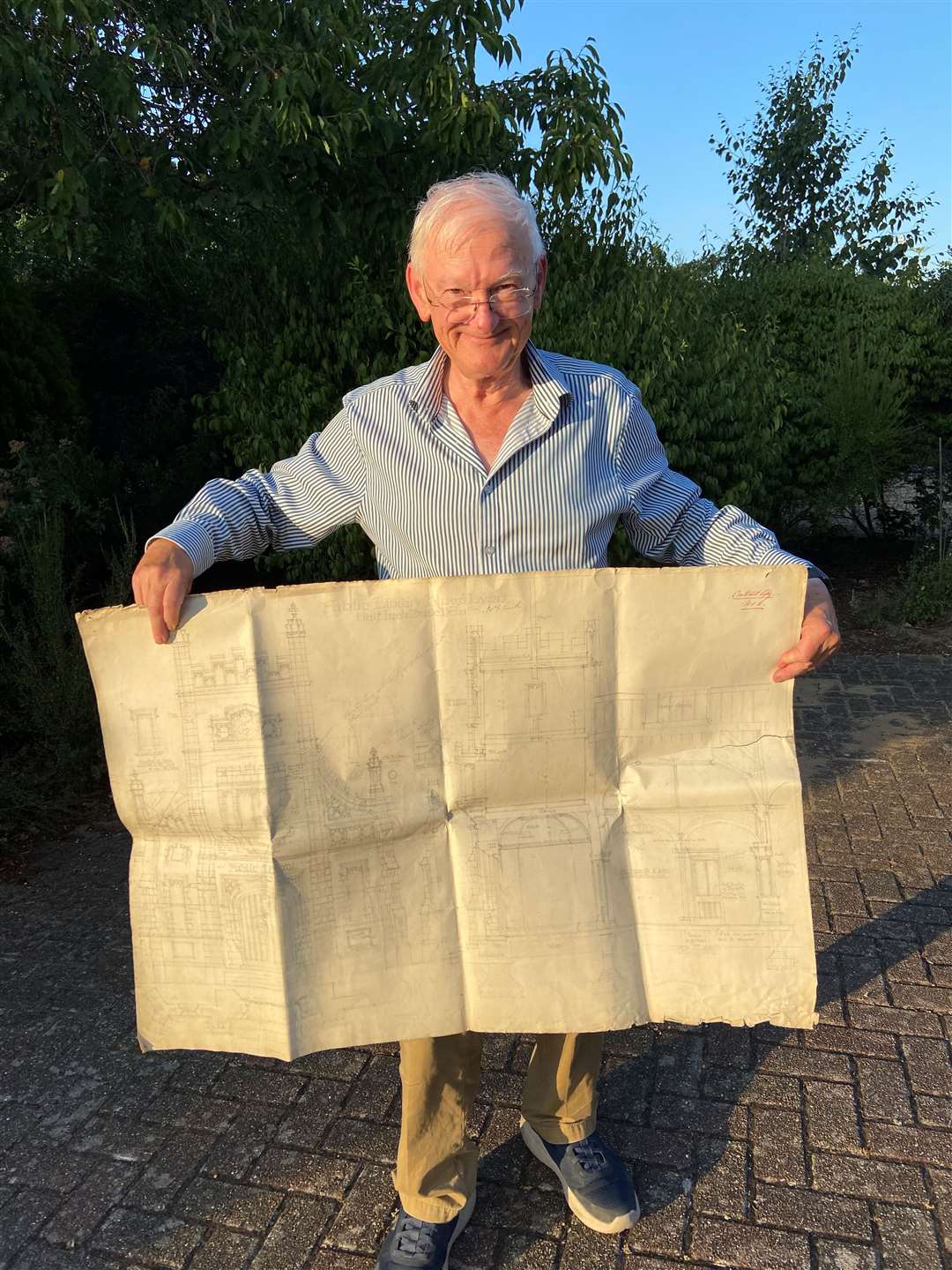Richard Waite with one of the two architect’s drawings. Pictures: Bob Childs
