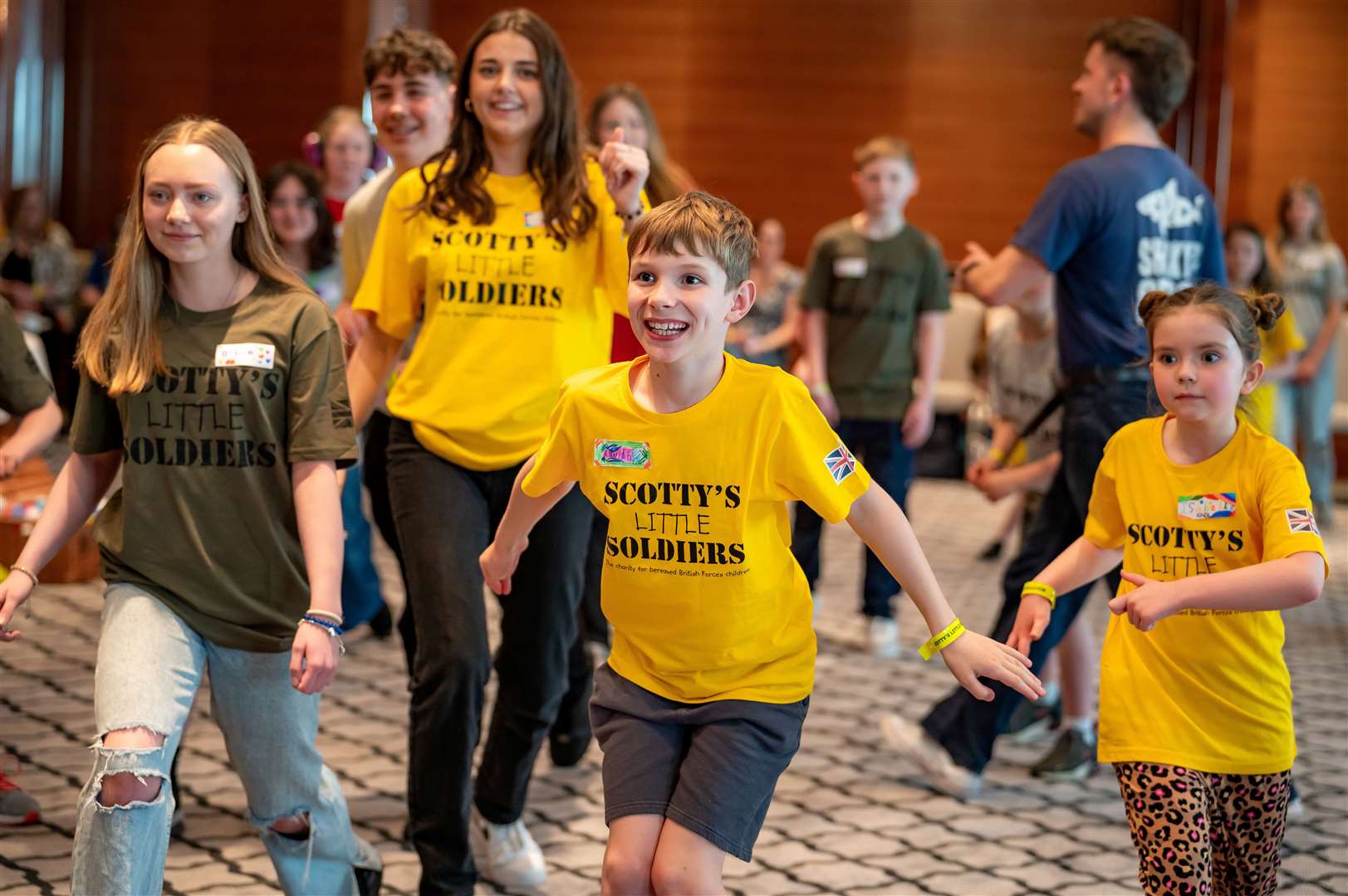 Members of Scotty's at an event in 2024