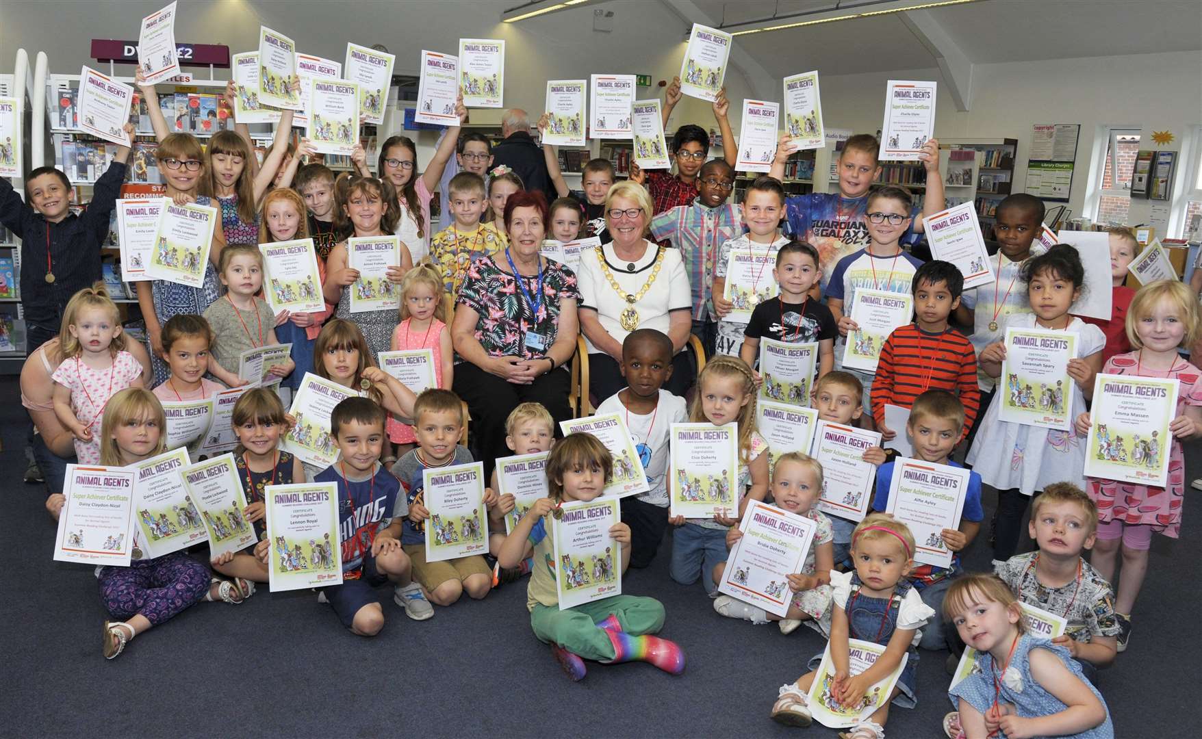Summer Reading Challenge Certificate and Medal Presentations at Gaywood Library. Margaret Wilkinson with the children...