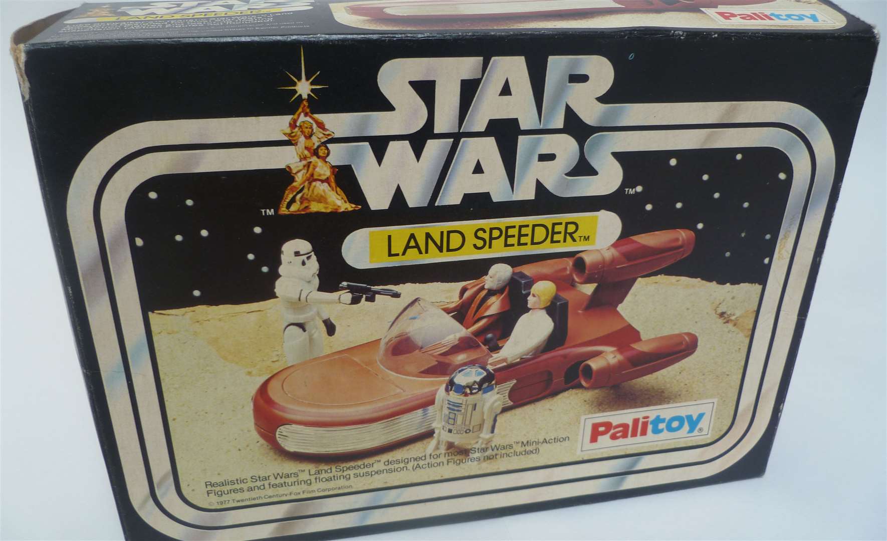 Land speeder toy in its original packaging