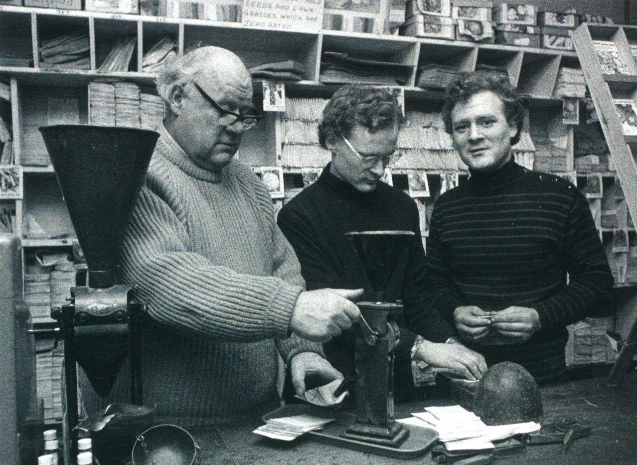 Twin brothers Jim and Bob Taylor with their father in the Taylor's seed shop, King's Lynn, about 1980. Pictures: Taylor's seed shop