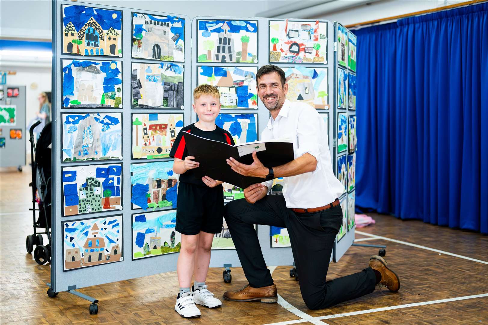 Pupils and teachers with their art